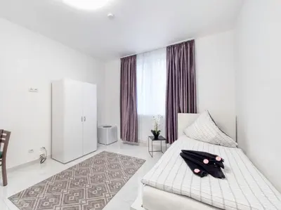 Ein Bett oder Betten in einem Zimmer der Unterkunft Pension Amanda