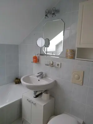 Ein Badezimmer in der Unterkunft Ferienwohnung Blütenstadt Werder-Havel