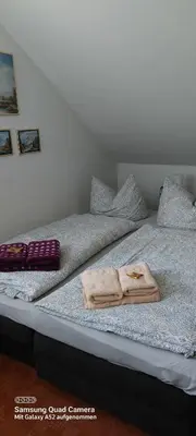 Ein Bett oder Betten in einem Zimmer der Unterkunft Ferienwohnung Blütenstadt Werder-Havel