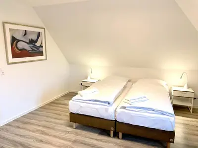 Ein Bett oder Betten in einem Zimmer der Unterkunft Ferienwohnung Bad Saarow