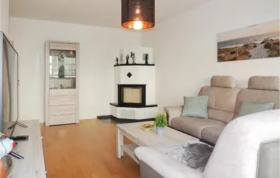 Ein Sitzbereich in der Unterkunft Beach Front Apartment