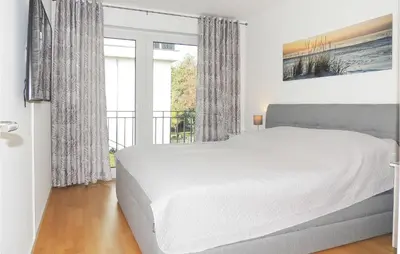 Ein Bett oder Betten in einem Zimmer der Unterkunft Beach Front Apartment