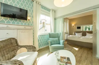 Ein Bett oder Betten in einem Zimmer der Unterkunft SATAMA Sauna Resort & SPA