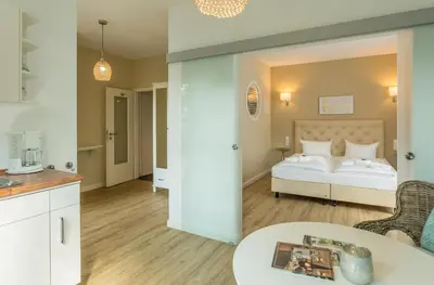 Ein Bett oder Betten in einem Zimmer der Unterkunft SATAMA Sauna Resort & SPA