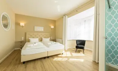 Ein Bett oder Betten in einem Zimmer der Unterkunft SATAMA Sauna Resort & SPA