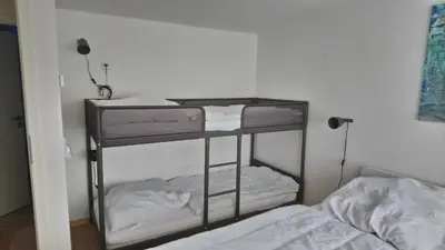 Ein Bett oder Betten in einem Zimmer der Unterkunft Ferienhaus Saremba