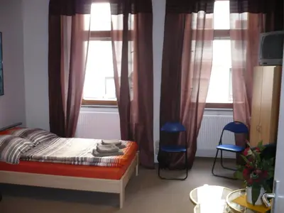 Ein Bett oder Betten in einem Zimmer der Unterkunft Apartment Jannowitzbrücke