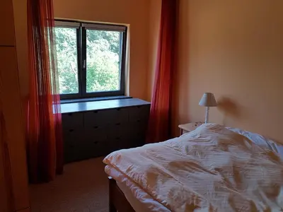 Ein Bett oder Betten in einem Zimmer der Unterkunft Große Wohnung / Haushälfte in Peetzig am See