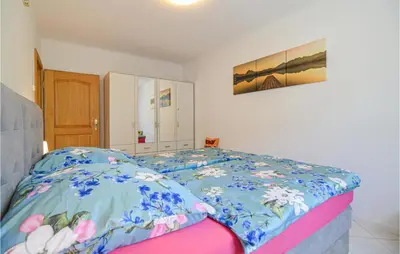 Ein Bett oder Betten in einem Zimmer der Unterkunft Gorgeous Apartment In Berlin-Bohnsdorf