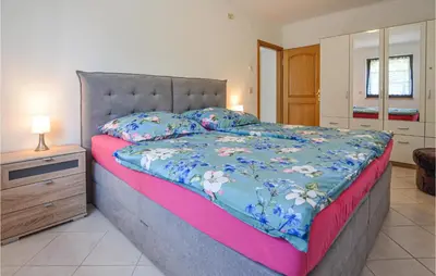 Ein Bett oder Betten in einem Zimmer der Unterkunft Gorgeous Apartment In Berlin-Bohnsdorf