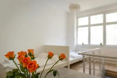 Ein Bett oder Betten in einem Zimmer der Unterkunft Newton-Appartement mit 3 Schlafzimmern