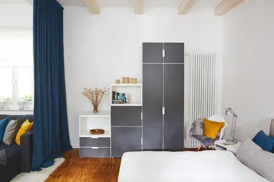 Ein Bett oder Betten in einem Zimmer der Unterkunft Altstadtloft Teltow