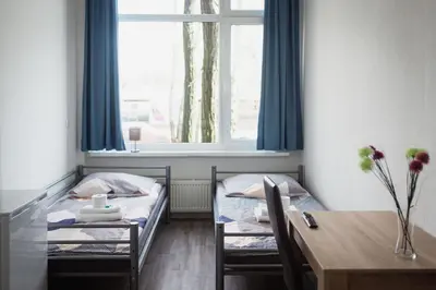 Ein Bett oder Betten in einem Zimmer der Unterkunft NeoHostel