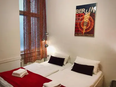 Ein Bett oder Betten in einem Zimmer der Unterkunft Boutique Hostel LEKKERURLAUB