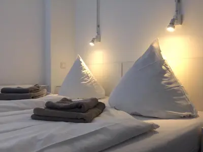 Ein Bett oder Betten in einem Zimmer der Unterkunft Apartment&Rooms near Brandenburg Gate