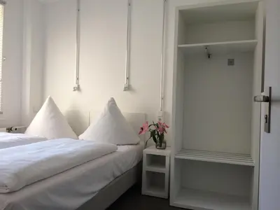 Ein Bett oder Betten in einem Zimmer der Unterkunft Apartment&Rooms near Brandenburg Gate