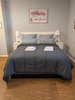 Ein Bett oder Betten in einem Zimmer der Unterkunft Lendelhaus & Historische Saftfabrik Werder