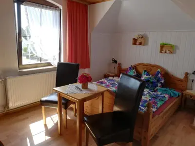 Ein Sitzbereich in der Unterkunft Pension Haus zum See GbR