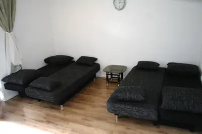 Ein Sitzbereich in der Unterkunft Central Apartments