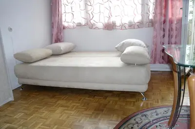 Ein Bett oder Betten in einem Zimmer der Unterkunft Kudamm Apartment West Central City