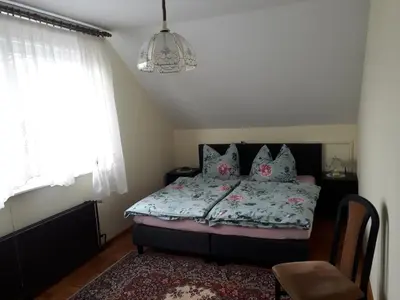 Ein Bett oder Betten in einem Zimmer der Unterkunft Ferienunterkunft in Berlin-Pankow Rosenthal