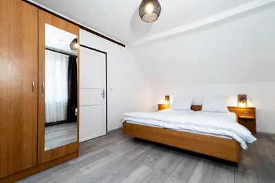Ein Bett oder Betten in einem Zimmer der Unterkunft Pension zur Schleuse Kleinmachnow