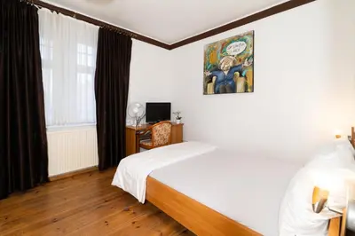Ein Bett oder Betten in einem Zimmer der Unterkunft Pension zur Schleuse Kleinmachnow