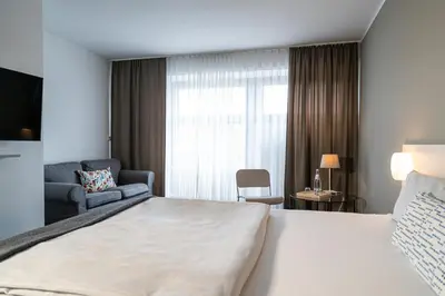 Ein Bett oder Betten in einem Zimmer der Unterkunft BIG MAMA Berlin