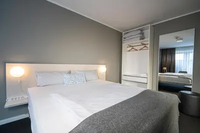 Ein Bett oder Betten in einem Zimmer der Unterkunft BIG MAMA Berlin
