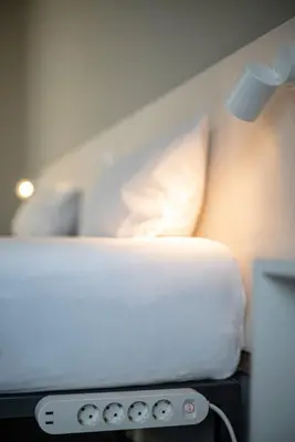Ein Bett oder Betten in einem Zimmer der Unterkunft BIG MAMA Berlin