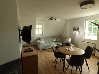 Ein Sitzbereich in der Unterkunft Gasthof & Fleischerei Rheinsberg