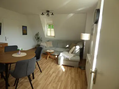 Ein Sitzbereich in der Unterkunft Gasthof & Fleischerei Rheinsberg