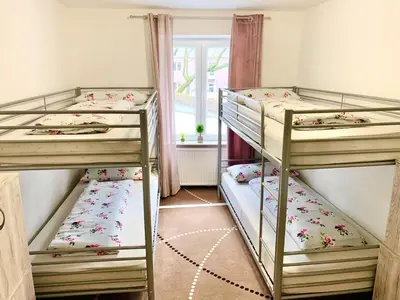 Ein Bett oder Betten in einem Zimmer der Unterkunft New Hostel Berlin Mitte FREE SNACK hot tea and coffee