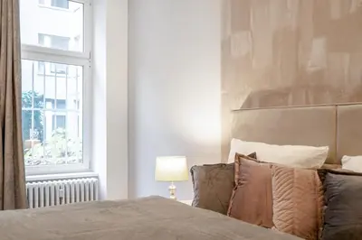 Ein Bett oder Betten in einem Zimmer der Unterkunft Cozy Einstein