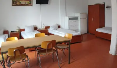 Ein Bett oder Betten in einem Zimmer der Unterkunft Hostel am Kurtti
