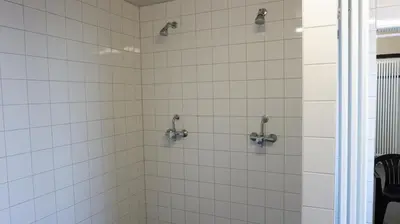 Ein Badezimmer in der Unterkunft Hostel am Kurtti