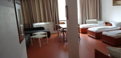 Ein Bett oder Betten in einem Zimmer der Unterkunft Hostel am Kurtti