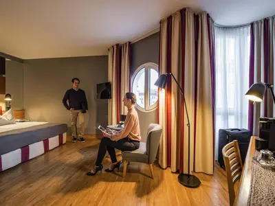 Ein Bett oder Betten in einem Zimmer der Unterkunft Mercure Hotel Berlin Zentrum Superior
