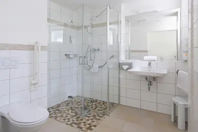 Ein Badezimmer in der Unterkunft Hotel Morgenland