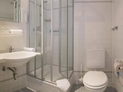 Ein Badezimmer in der Unterkunft Hotel Morgenland