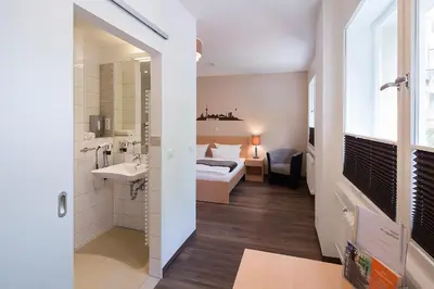 Ein Bett oder Betten in einem Zimmer der Unterkunft Hotel Morgenland