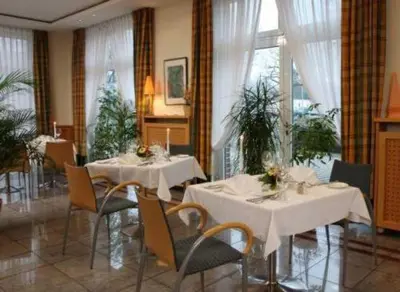 Ein Sitzbereich in der Unterkunft Stadthotel Oranienburg