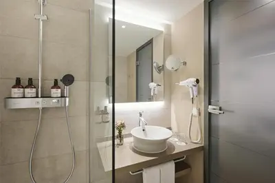 Ein Badezimmer in der Unterkunft NH Berlin Kurfürstendamm