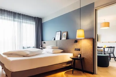 Ein Bett oder Betten in einem Zimmer der Unterkunft harry's home Berlin-Moabit hotel & apartments