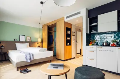 Ein Bett oder Betten in einem Zimmer der Unterkunft harry's home Berlin-Moabit hotel & apartments