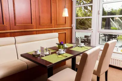 Ein Sitzbereich in der Unterkunft SensCity Hotel Berlin Spandau