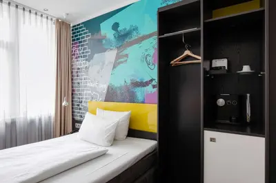 Ein Bett oder Betten in einem Zimmer der Unterkunft Hotel Berlin, Berlin, a member of Radisson Individuals