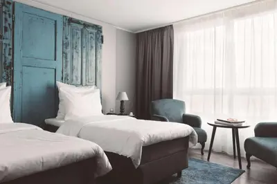 Ein Bett oder Betten in einem Zimmer der Unterkunft Hotel Berlin, Berlin, a member of Radisson Individuals