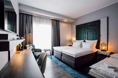 Ein Bett oder Betten in einem Zimmer der Unterkunft Hotel Berlin, Berlin, a member of Radisson Individuals