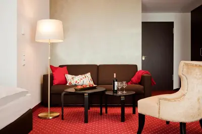 Ein Sitzbereich in der Unterkunft Gold Palais Hotel